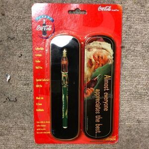Vintage 1990’s Coca Cola Collectible Ceramic Roller Ball Pen and Santa Tin NEW